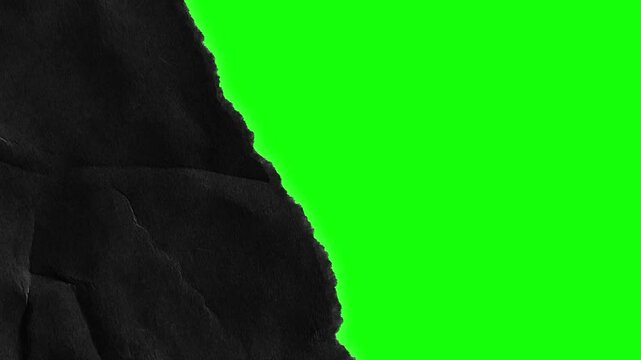 The torn paper transition animation is on a green background. Torn paper transition animation with key color. 4k video	