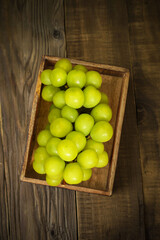 grapes in a wooden bowl