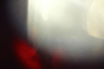 Obraz premium Abstract background. Sun Rays on black background. Flare with rays.