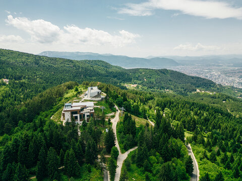 A captivating aerial view of Sarajevo's cityscape nestled amidst the scenic hills of Bosnia and Herzegovina.