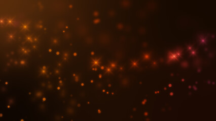 Gold dust particle, glow bokeh effect on dark background.