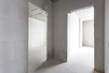 interior of the apartment without decoration in gray colors. rough finish