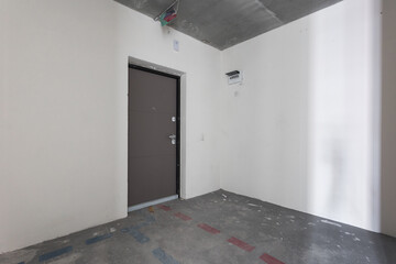 interior of the apartment without decoration in gray colors. rough finish