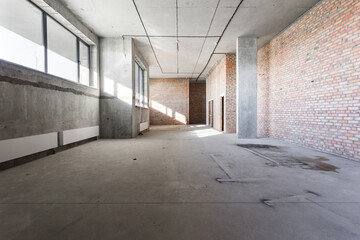 interior of the apartment without decoration in gray colors. rough finish