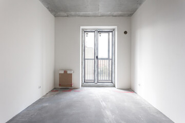 interior of the apartment without decoration in gray colors. rough finish