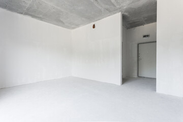 interior of the apartment without decoration in gray colors. rough finish