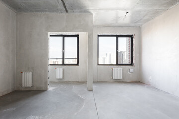 interior of the apartment without decoration in gray colors. rough finish