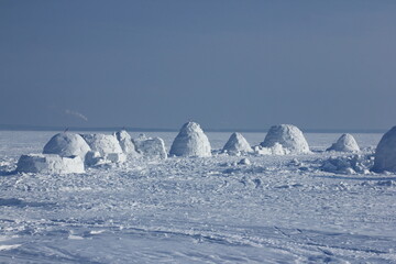 Winter dwelling of Eskimos. Igloo.  Eskimos village. 
