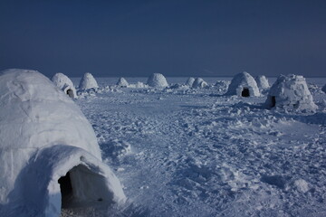 Winter dwelling of Eskimos. Igloo.  Eskimos village. 