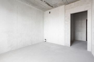 interior of the apartment without decoration in gray colors. rough finish