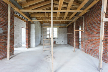 interior of the apartment without decoration in gray colors. rough finish