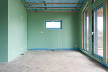 interior of the apartment without decoration in gray colors. rough finish