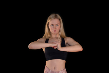 Confident Athletic Girl in Sportswear Showing Determination