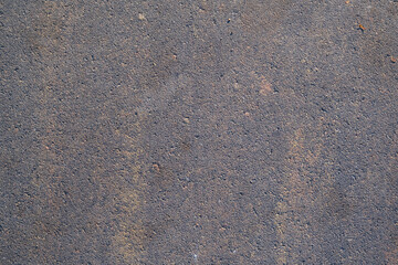 The texture of artificial stone used for wall and floor cladding.