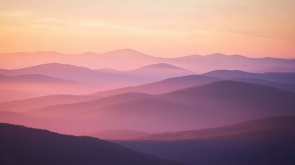Fototapeta premium Serene Sunrise Over Mountain Range with Soft Light