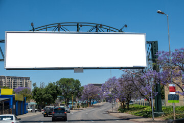 Blank empty billboard mockup template for advertising over a highway in South Africa.