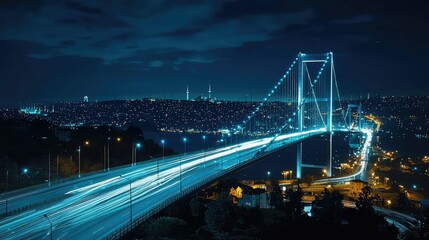 Obraz premium Illuminated Modern Suspension Bridge at Night