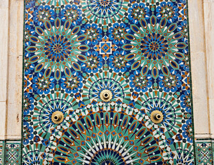 beautiful Moroccan Colorful zellige tiles pattern - Mosaic pattern, traditional Islamic Moroccan geometric design in the Exterior of Hassan II Mosque w