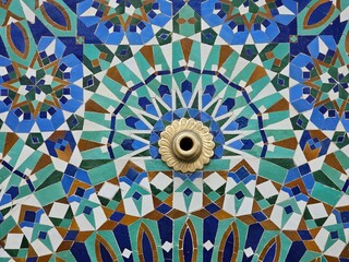 beautiful Moroccan Colorful zellige tiles pattern - Mosaic pattern, traditional Islamic Moroccan geometric design in the Exterior of Hassan II Mosque w