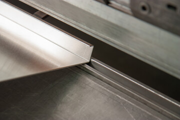 Aluminum Press Brake machine up close in detail with 3 millimeter aluminum 90 degrees bent with a...