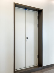 Modern White Door Framed in Minimalist Interior Design