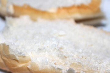 close up of bread. close up of a slice of bread. bread with selective focus. food details.