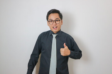 young asian men wearing black shirt thumb up gesture