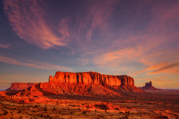 Landscape view of Monument valley with dramatic colorful sunset, USA
