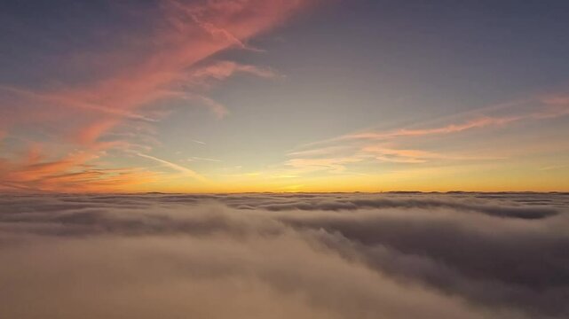 Breathtaking Sunrise Above the Clouds on Snowdon Summit, Snowdonia National Park in Wales