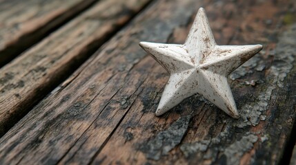 Shiny silver star resting on rustic wood surface, ideal for decorative purposes, copy space