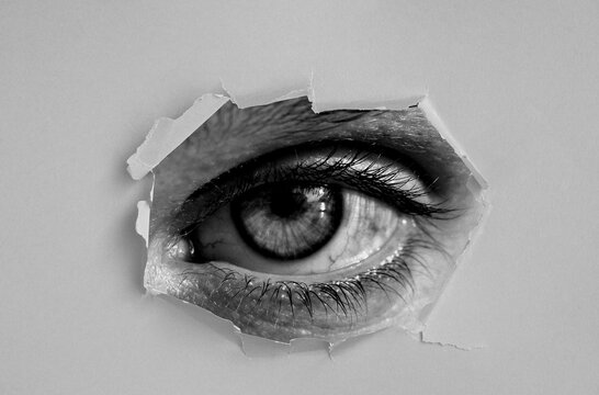 Old ripped torn blank grunge posters backgrounds creased crumpled paper backdrop surface placard empty space for text woman close-up eye