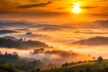 Obraz premium A stunning sunrise illuminates rolling hills, shrouded in mist, creating a serene and picturesque landscape.