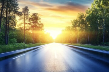 Fototapeta premium Tranquil road stretching through sunset-lit tree-lined path with calm reflections and peaceful ambiance.