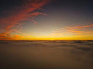 Breathtaking Sunrise Above the Clouds on Snowdon Summit, Snowdonia National Park in Wales