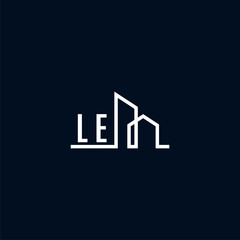 LE initials a sleek and modern logo showcases abstract architectural shapes, emphasizing creativity and innovation in building design against a dark background