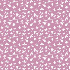 Delicate clover silhouettes scattered on pink background. Seamless pattern for textiles, paper, merchandise, creative projects
