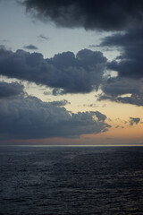 Obraz premium Dark sunset at sea with clouds 3