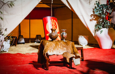 Roman a military camp with shield and helmet in historical reenactment campfire 