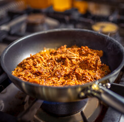 Pork cooking in the restaurant kitchen.