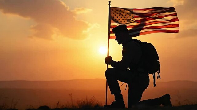 Soldier Kneeling in Prayer with American Flag at Sunset