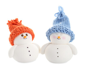 Two cute decorative snowmen isolated on white