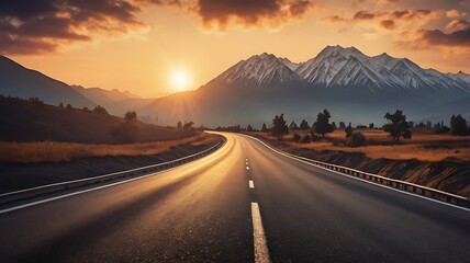 Sunset over a scenic curved highway asphalt road with a mountain