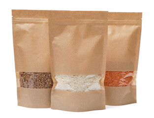 Paper pouch bags with buckwheat, rice and lentil isolated on white