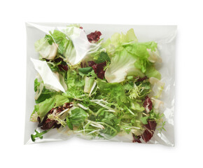 Pack of fresh salad mix isolated on white, top view