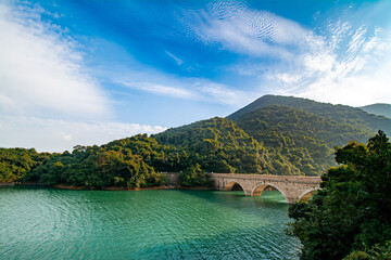 Tai Tam Reservoir in Hong Kong. It is surrounded by the Tai Tam Waterworks Heritage Trail which features heritage water facilities in Hong Kong.