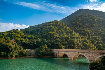 Tai Tam Reservoir in Hong Kong. It is surrounded by the Tai Tam Waterworks Heritage Trail which features heritage water facilities in Hong Kong.