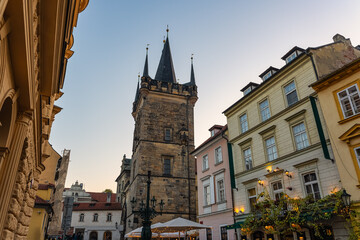 Medieval towers in the monumental city of Prague at the entrance to Charles Bridge, Czech Republic.