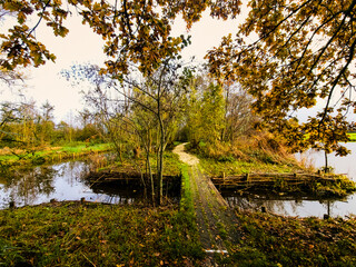 Dutch polder landscape with peat quay Spookverlaat at Kruiskade, Hazerswoude-Rijndijk and ditch...