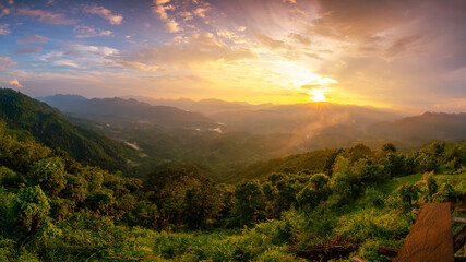Aerial Panorama view of rain forest mountain during sunrise or sunset time in North of Thailand.