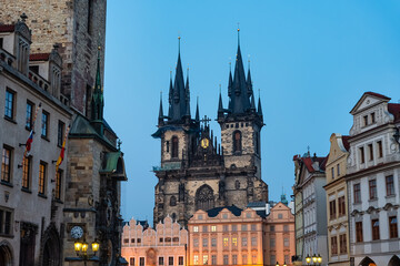 Prague City Square with medieval buildings and the Tyn Church in the background.